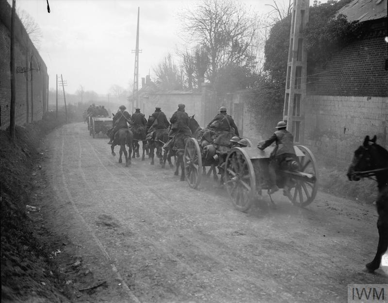 IWM Q 8632 Royal Field Artillery passing through Mailly-Maillet to meet the German advance 26 Mar 1918