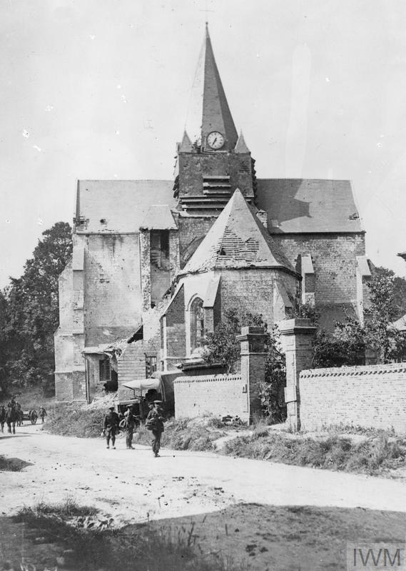 IWM (Q 60809) British troops passing by the church at Mailly-Maillet, 23 August 1918