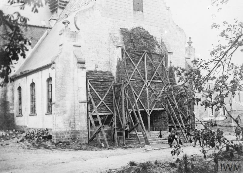 IWM (Q 60811) Entrance of the church at Mailly-Maillet, showing brushwood protection on stained glass windows, 29 April 1918