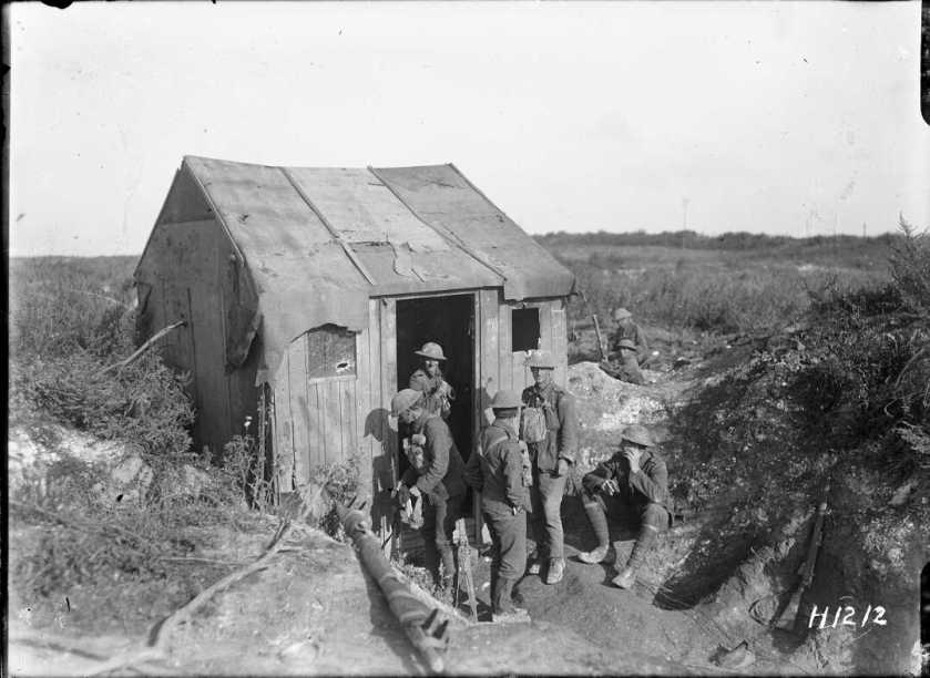 nlnzimage 1-2 013759-G NZ troops with a captured German hut, Bapaume, 27 Aug 1918