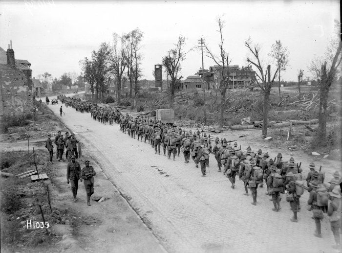 nlnzimage 1-2 013604-G NZ battalion passing through Bapaume, 14 Sep 1918