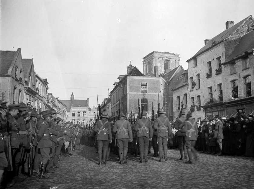 nlnzimage 1-4 017543-F NZ troops marching through Le Quesnoy, 10 Nov 1918